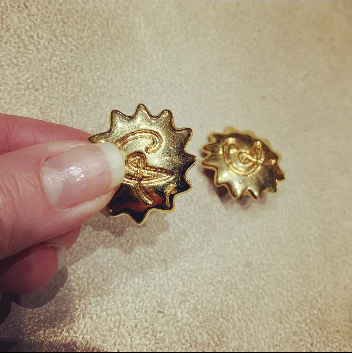 Christian Lacroix gold Starburst clip on earrings