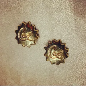 Christian Lacroix gold Starburst clip on earrings