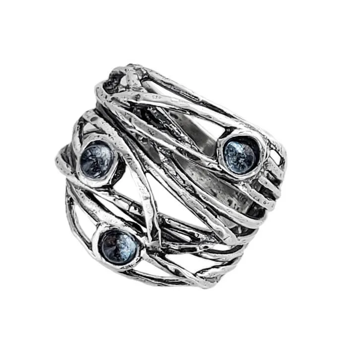 Israeli Intertwining Vines Holding Pools Of Blue Topaz Ring