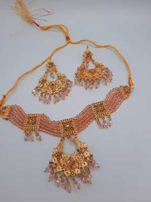 Pink guluband choker with earrings and teeka