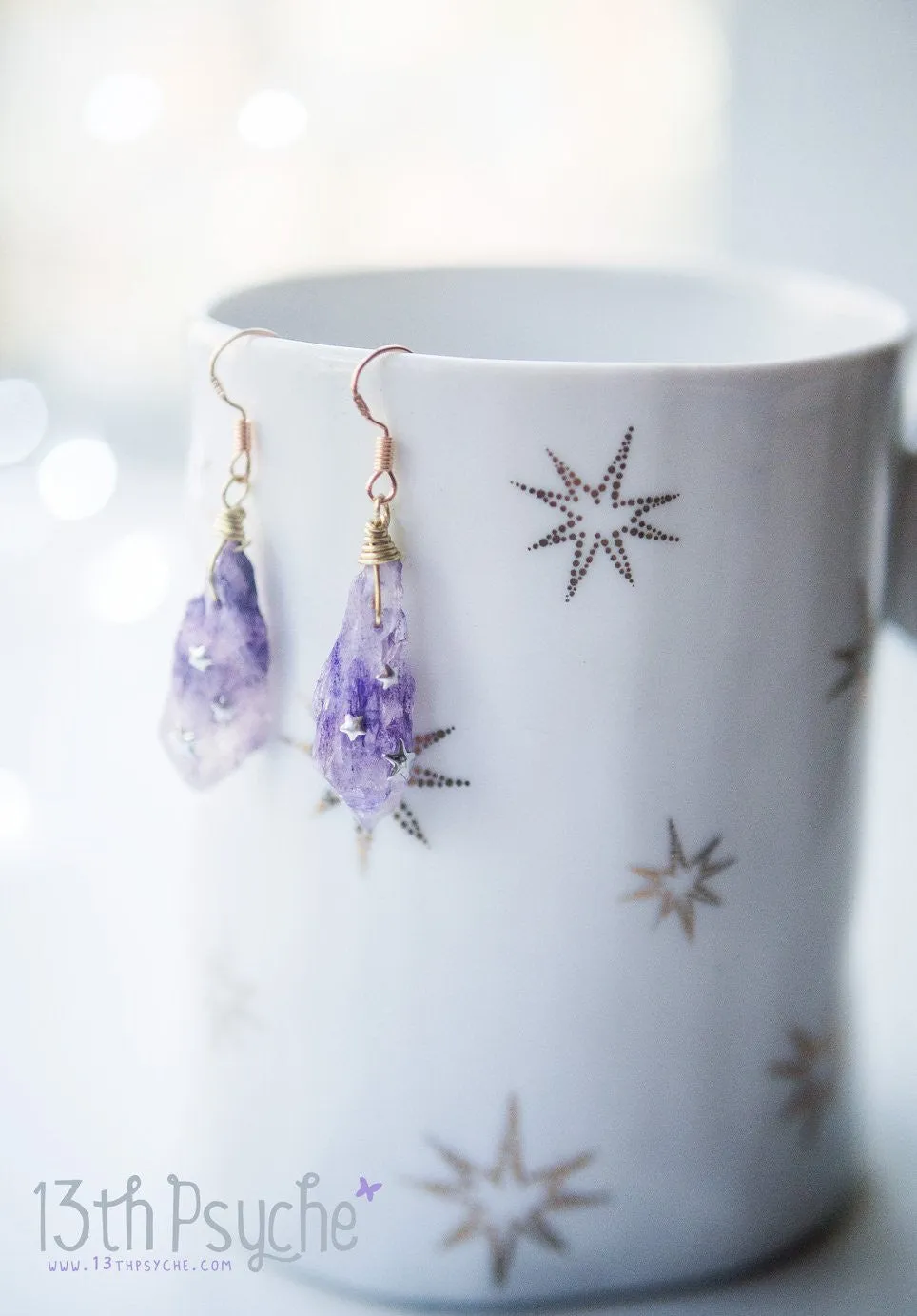 Purple raw stone earrings with silver stars